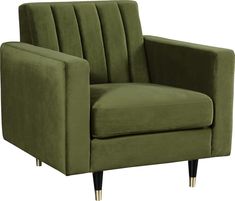 a green velvet chair with gold legs