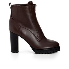 Step into timeless style with the Fern Ankle Boot. Its round toe and thick block heel ensure comfort without compromising on fashion. The front zip closure allows for easy wear, and the thick sole adds a touch of stability. Complete with back tabs for effortless on-and-off, this boot is perfect for any casual or chic ensemble. Bold and fiercely fashionable, no one does plus size fashion like City Chic. Loved around the globe for its diverse range of fashion-forward styles for any occasion. From Brown Ankle Platform Boots For Work, Brown High Ankle Platform Boots For Workwear, Brown Ankle Platform Boots For Workwear, Brown Boots With Lug Sole And Block Heel, Brown Lug Sole Platform Boots For Work, Brown Platform Boots With Lug Sole For Work, Chic Brown Platform Boots For Work, Brown High Heeled Boots With Deep Heel Cup, Brown Platform Boots With Block Heel