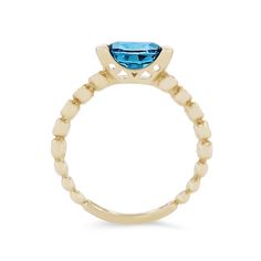 A truly modern design, this ring features an oval cut London blue topaz weighing 1.53 carats set horizontally in a half-bezel setting accented by 0.09 carats of round brilliant cut diamonds. Diamond Bezel Ring, Half Bezel Setting, Diamonds Direct, Half Bezel, Bezel Ring, Bezel Diamond, London Blue Topaz, London Blue, Round Brilliant Cut Diamond