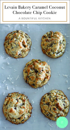 several cookies on a baking sheet with coconut flakes and chocolate chips in the middle