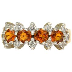 1.77ct. Natural Orange Sapphires Clean VS Clarity Vivid orange saturation Round cuts. Each: 4.5mm .50ct. round diamonds. Fully cut and faceted. G-color, VS-2 clarity 18kt. yellow gold 8.37mm wide 6.9 grams Current size 6.25 we can resize, please inquire $4500 appraisal will accompany Orange Round Jewelry With Brilliant Cut, Orange Multi-stone Fine Jewelry Rings, Classic Orange Topaz Round Ring, Fine Jewelry Orange Diamond Ring, Orange Topaz Round Ring For Anniversary, Orange Topaz Ring With Prong Setting, Orange Topaz Round Ring, Orange Topaz Anniversary Ring, Orange Topaz Rings For Anniversary