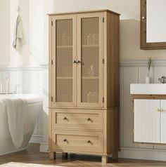 a bathroom with a sink, cabinet and bathtub