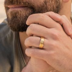 a close up of a person wearing a ring