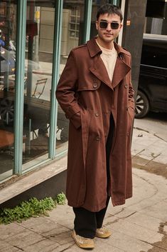 Discover the perfect blend of style and comfort with our Unisex Oversized Brown Trench Coat, designed in an 80s Vintage Style with Shoulder Pads and a Long Belted silhouette. This double-breasted trench coat is a must-have for anyone who loves timeless fashion with a modern twist. What Makes This Coat Special: 80s Iconic Design: Featuring shoulder pads, a double-breasted front, wide lapels, and a belted waist, this trench coat captures the essence of 80s fashion while offering a sleek, contempor Retro Solid Color Outerwear For Work, Retro Long Coat For Workwear, Retro Long Coat Outerwear With Pockets, Vintage Fall Outerwear, Retro Oversized Outerwear For Work, Vintage Oversized Single Breasted Outerwear, Long Brown Trench Coat, Vintage Long Outerwear With Pockets, Vintage Trench Coat