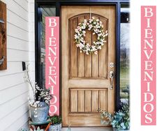 a wooden door with a wreath on the front and side of it that says bienvenndos