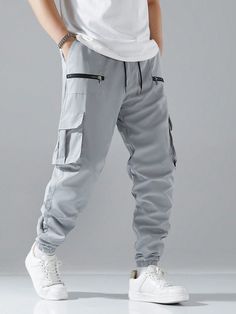 Loose Fit Men Cargo Pants With Flap Pockets, Drawstring Waist, And Side Pockets Light Grey Street   Fabric Plain Cargo Pants Non-Stretch Spring/Summer/Fall Men Clothing, size features are:Bust: ,Length: ,Sleeve Length: Styles For Boys Outfits, Style Homme Streetwear, Mens Clothing Styles 2024, Lower For Men, Flatlay Photography Clothing, Men Cargo Pants, Boys Khaki Pants, Tomboy Swag, Pants Embellished