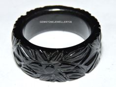 Buyers will receive 1 piece natural black obsidian carved band / obsidian made ring band. This item is so beautiful and made with natural gemstone .you will really love it. Product - Natural Black Obsidian Carved Band Gemstone - Obsidian Quantity - 1 Piece 100% Natural Gemstone Note - Please choose your ring size from the variation drop down menu. If you want our product in more quantity then please feel free to contact us we can make you provide as much as quantity as you want as we have our own manufacturing unit Black Carved Round Rings, Carved Black Rings As Gift, Carved Black Rings For Gift, Black Carved Ring Jewelry, Black Carved Round Jewelry, Black Obsidian Ring, Obsidian Jewelry, Obsidian Ring, Black Obsidian