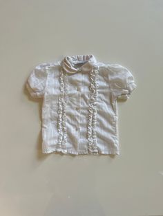 Adorable layering short for under jumpers and overalls. Sheer white with a bit of a stripe in it and puff sleeves. No size on tag. Measures 15 inches long and 13 inches across pit to pit. Seems best for 5T or 6X. Xmas Outfit, Puff Sleeve Blouse, White Blouse, Sheer Blouse, Short Girls, Short Sleeve Blouse, Holiday Festival, White Vintage, Puff Sleeve