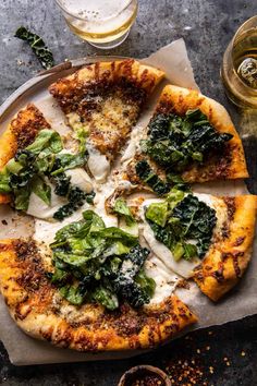 a pizza sitting on top of a pan covered in cheese and vegtables