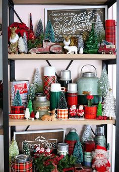 a shelf filled with christmas decorations and other items