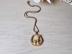 This gorgeous gold deer pendant necklace is such a classic and perfect for autumn. This vintage 1970s wreath necklace is pretty on its own or perfect for layering. Featuring a gold leaf pendant in a wreath shape with a beautifully detailed deer. Pendant is a nice solid weight, on gold small link chain. In great vintage condition, no flaws to note.  Dimensions:  15" long. leaf pendant is 1.5" ► Shop more of my necklaces here: http://etsy.me/GSHm8k ► Explore other vintage treasures: http://etsy.me Vintage Gold Christmas, Whimsigoth Jewelry, Deer Pendant, Gold Christmas Wreath, Wreath Necklace, Deer Necklace, Gold Deer, Gold Leaf Pendant, Jewelry Beautiful