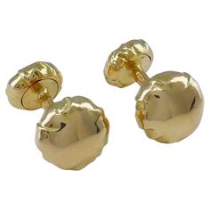 A pair of 18k gold cufflinks by Angela Cummings, designed as classic button cufflinks with Cummings' signature organic approach. The tops looks like buttons covered with fabric. The gold perfectly imitates fabric folds. These Angela Cummings cufflinks are high-polished gold which makes them look great either with your black tie attire or as a dressy option for a business suite. About Angela Cummings brand Angela Cummings is one of the most prominent fine jewelry designers and women jewelry desig Luxury Classic Yellow Gold Cufflinks, Vintage Gold Cufflinks With Polished Finish, Luxury Vintage Yellow Gold Cufflinks, Gold Vintage Cufflinks With Polished Finish, Vintage Collectible Cufflinks, Jewelry Education, David Webb, Elsa Peretti, Gold Cufflinks