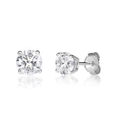 Experience elegance with our stunning 1.20ct Round Brilliant Cut Diamond Stud Earrings, meticulously crafted in durable 14K white gold. Each earring showcases a stunning round brilliant cut diamond, boasting the alluring hues of I-J color and SI2 clarity. These timeless earrings are more than just accessories; they're a symbol of beauty and femininity, perfect for adding a touch of sophistication to any ensemble. Timeless Earrings, Diamond Stud Earrings, Diamond Stud, Round Brilliant Cut Diamond, Diamond Earrings Studs, Brilliant Cut Diamond, Diamond Studs, Round Brilliant, White Gold