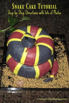 a snake cake sitting on top of a table