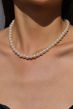 Elevate your accessory collection with our Elegant Pearl Necklace, a timeless piece designed to add a touch of sophistication to any outfit. This beautiful necklace features perfectly round, lustrous pearls strung together, creating a classic and elegant look. Whether you're dressing up for a special occasion or adding a refined touch to your everyday ensemble, this necklace is the perfect choice. Key Features: Timeless Elegance: The necklace features perfectly round, lustrous pearls, offering a Elegant Pearl Chain Beaded Necklace, Elegant Round Pearl Chain Beaded Necklace, Classic Pearl White Necklace With Clavicle Chain, Elegant Pearl White Beaded Necklace With Clavicle Chain, Elegant Pearl White Round Beaded Necklace, Classic Necklaces With Clavicle Chain And Round Beads, Classic Single Strand Beaded Necklace For Parties, Classic Clavicle Chain Necklaces With Round Beads, Classic Clavicle Chain Necklace With Round Beads