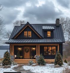 a house with christmas lights on the front porch