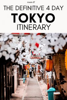 an alley way in tokyo with text overlay that reads the definitive 4 day tokyo itinerary