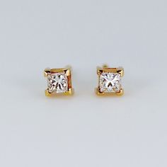 These beautiful 14K yellow gold princess diamond stud earrings are the perfect accessory for any ensemble. The timeless design and bright diamonds are sure to bring sparkle and elegance to any look. They will make a great companion to your beautiful wedding. They are very elegant for daily use or for official gatherings. DETAILS *** 14k solid gold studs *** Princess cut natural diamonds are 3.2mm and (0.22 ct each) Total 0.44 ct *** Diamonds are G-H Color *** SI1 clarity *** Prong settings. *** Mini Diamond Earrings, Gold Princess Cut Earrings For Formal Occasions, Gold Princess Cut Earrings For Formal Events, Vvs Clarity Princess Cut Diamond Earrings For Formal Occasions, Fine Jewelry Princess Cut Diamond Earrings With Accents, Vvs Clarity Princess Cut Diamond Earrings For Formal, Princess Cut Cubic Zirconia Earrings With Prong Setting, Princess Cut Cubic Zirconia Diamond Earrings, White Gold Diamond Cut Princess Cut Earrings