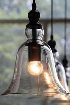 several lights hanging from a ceiling in a room