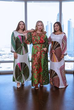 Plus size caftan dress green circles Green Silk Tunic Kaftan, Green Silk Long Sleeve Kaftan, Patterned Maxi Length Kaftan, Green Silk Dress With Kimono Sleeves, Silk Printed Dress For Eid, Green Maxi Dress With Kimono Sleeves, Green Printed Kaftan With Kimono Sleeves, Green Dress For Eid Vacation, Green Dress For Vacation And Eid