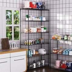 the shelves in this kitchen are filled with various items