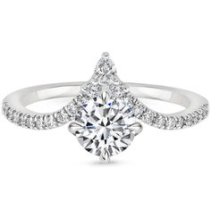 a white gold engagement ring with diamonds on it