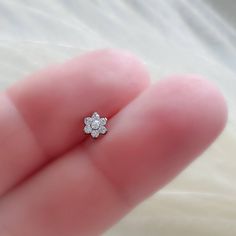 Dainty Flower Earrings With 3d Flowers, Dainty White Gold Wedding Piercings, Dainty Tiny Flower-shaped Jewelry, Tiny Dainty Flower-shaped Jewelry, Delicate Tiny Flower Shaped Jewelry, Minimalist Tiny Flower Shaped Jewelry, Minimalist Tiny Flower Jewelry, Delicate Internally Threaded Wedding Jewelry, Tiny Delicate Silver Piercings