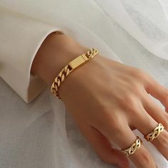 Add a touch of elegance and sophistication to your wrist with this stunning Sanza London Luxury geometric chain bracelet. Crafted from high-quality 18K gold-plated stainless steel, this bracelet features a thick magnet-GOLD chain that is both stylish and practical. Measuring 17.5 cm in length, this bracelet is perfect for any occasion, whether it's a special event like a wedding or anniversary, or an everyday accessory. The bracelet is designed with a magnetic closure, making it easy to wear and Gold Bracelet Women, Bracelet With Name, Gold Cuban Chain, Bracelet Thick, Cuban Chain Bracelet, Cuban Bracelet, Chunky Gold Chain, Body Oils, Gold Bracelet Chain