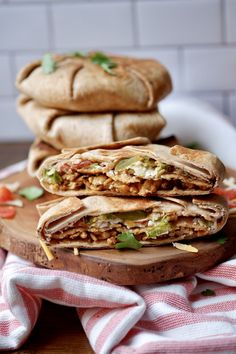 the healthy crunch wraps are stacked on top of each other and ready to be eaten