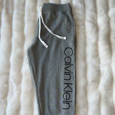 Comfortable Brand New, Never Worn Jogger’s For Sleep, Lounge Or Play In 60% Cotton & 40% Polyester. Sporty Calvin Klein Cotton Bottoms, Calvin Klein Relaxed Fit Cotton Pants, Calvin Klein Casual Loungewear Pants, Calvin Klein Bottoms For Spring Loungewear, Calvin Klein Relaxed Cotton Pants, Trendy Gray Pants With Letter Print, Trendy Fitted Calvin Klein Bottoms, Gray Fitted Casual Sweatpants, Trendy Gray Sweatpants For Loungewear