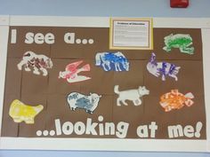 a bulletin board with different animals and words written on it that read i see a looking at me