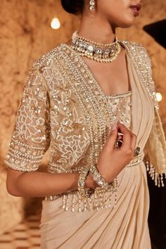 Gold cape with sequin embroidered floral blossom motifs highlighted by pearls. Comes with shimmer base pre-draped saree, padded blouse and belt. - Aza Fashions Gold Organza Saree, Saree Cape, Heavy Blouses, Drape Sari, Golden Blouse Designs, Diwali Dress, Golden Blouse, Gold Organza, Saree Jackets