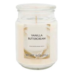 vanilla buttercream candle in a glass jar