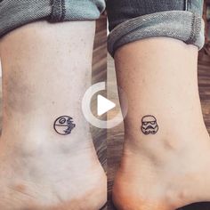 two people with matching tattoos on their feet, one has a wave and the other has a boat