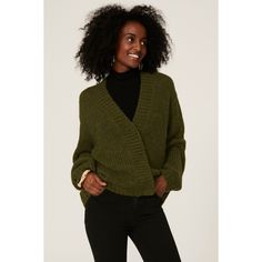 Green knit (40% Nylon, 30% Wool, 30% Alpaca). Cardigan. Long sleeves. Front button closure. 23" from shoulder to hem. Imported. Winter Textured Knit Cardigan For Work, Soft Knit V-neck Sweater For Work In Fall, Winter Workwear Cardigan With Textured Knit, Cozy Green Cardigan For Work, Spring Cardigan For Cold Weather, Chic Green Knit Outerwear, Classic Green Long Sleeve Cardigan, Green Cotton Long Sleeve Cardigan, Green Long Sleeve Solid Cardigan