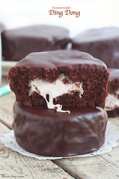 chocolate cake with white frosting on a plate