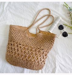 Beige Crochet Travel Bag With Handles, Trendy Handheld Crochet Bag For Travel, Trendy Handheld Crochet Travel Bag, Trendy Handheld Straw Bag For Travel, Summer Double Handle Gift Bag, Spring Travel Crochet Satchel Bag, Trendy Crochet Shoulder Bag For Travel, Beach Season Travel Tote Satchel, Spring Travel Handheld Crochet Bag