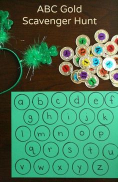 the abc gold scavenger hunt is shown next to some crafting supplies on a table