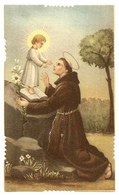 an image of a man kneeling down with a child on his lap