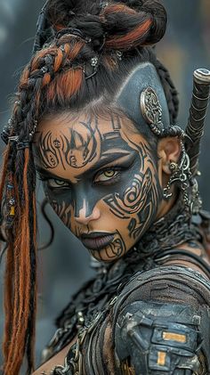 a woman with black and orange face paint