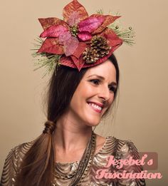 a woman wearing a red and gold hat with poinsettis on her head