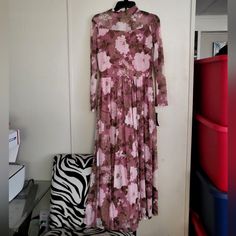 Stella & Julie Floral Mauve Mesh Long Sleeve Maxi Dress. This Dress Is Double Lined And Is Brand New. Size 6 Purple Long Sleeve Maxi Dress For Spring, Spring Floral Print Mauve Dress, Flowy Mauve Floral Print Dress, Fitted Mauve Floral Print Dress, Flowy Purple Maxi Dress For Fall, Spring Mauve Maxi Dress With Floral Print, Purple Floral Print Maxi Dress, Feminine Purple Long Sleeve Maxi Dress, Spring Party Mauve Maxi Dress