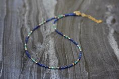 "I created this beautiful necklace using lapis and turquoise stones of excellent, as well as, sterling silver golden plated chain, beads and closure. Ideal for everyday use, as well as layering with other necklaces. I can also make it with sterling silver beads and finish. The length of the necklace is adjustable 33-38cm and it is also available as a set together with the sterling silver seedbead choker, that you can check here: https://www.etsy.com/listing/865797344/seedbead-choker-silver-beads Rings Stones, Stones Rings, Rings Stacking, Turquoise Choker, Choker Silver, Lapis Necklace, Lapis Lazuli Necklace, Dainty Bracelet, Choker Necklace Set