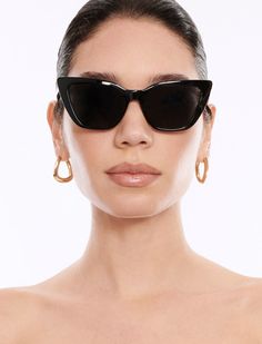 Fierce sunglasses with a slim cateye design. Crafted from a brown demi frame with solid smoke lenses that elevate your look.*This item is not eligible for Express or Premium shipping Elevate Your Look, Cat Eye Sunglasses, Cat Eye, Lenses, Shoe Accessories, Sunglasses, Frame, Design