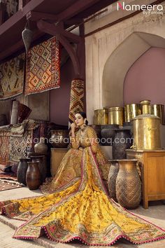 Festive Gold Sharara With Naqshi, Festive Gold Sharara With Naqshi Details, Festive Gold Naqshi Sharara, Gold Jamawar Dress With Resham Embroidery, Festive Gold Anarkali Set With Naqshi, Traditional Naqshi Festive Gown, Festive Naqshi Traditional Dola Silk Wear, Designer Wear Gown With Naqshi In Traditional Drape, Designer Gown With Naqshi In Traditional Drape