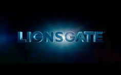 the words lionsgate are lit up against a dark background