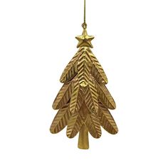 a gold christmas tree ornament hanging from a chain