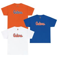 "Gator fans and Florida die-hards, this Florida Cursive Gators shirt is for you! This classic, adult unisex size Florida shirt features the word \"Gators\" in classic cursive Gators font, that wholeheartedly displays your Gator pride for ol' Florida! Sport it proudly on Gator game day in the Swamp, tailgating outside the stadium, or at home in your living room cheering on ol' Florida. Even outside of football season, you're sure to get compliments from fellow Gators while you're out to eat, at t Fan Merchandise T-shirt With Lettering And Short Sleeves, Fan Merchandise Short Sleeve T-shirt With Lettering, Fan Merchandise Graphic Tee With Lettering, Graphic Tee With Lettering For Fans, Graphic Tee With Lettering For Fan Merchandise, College Fan Apparel T-shirt With Lettering, Pre-shrunk Graphic Tee For Fan Gear, Collegiate T-shirt With Lettering For Sports Events, Collegiate Short Sleeve T-shirt With Lettering