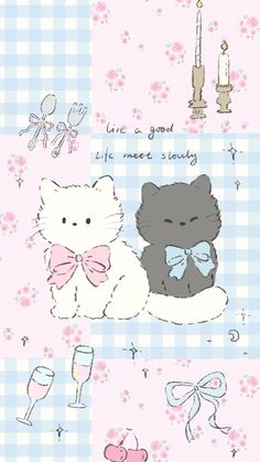 two cats sitting next to each other on a checkered tablecloth with pink flowers