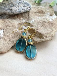 Pretty transparent aqua blue dangle earrings. Great for accessorizing your summer styles. Classic and simple. Blue Glass Window, Aqua Inspiration, Aquamarine Wedding, Jewelry Classic, Earrings Classic, Blue Dangle Earrings, Gold Dangle Earrings, Summer Styles, Bead Jewelry